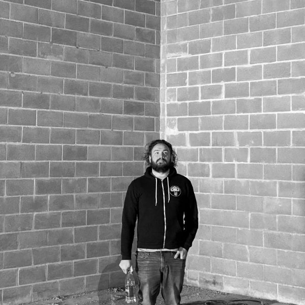 A member of the crew outside at the end of a shift